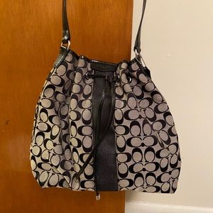 Coach handbag with draw string closure